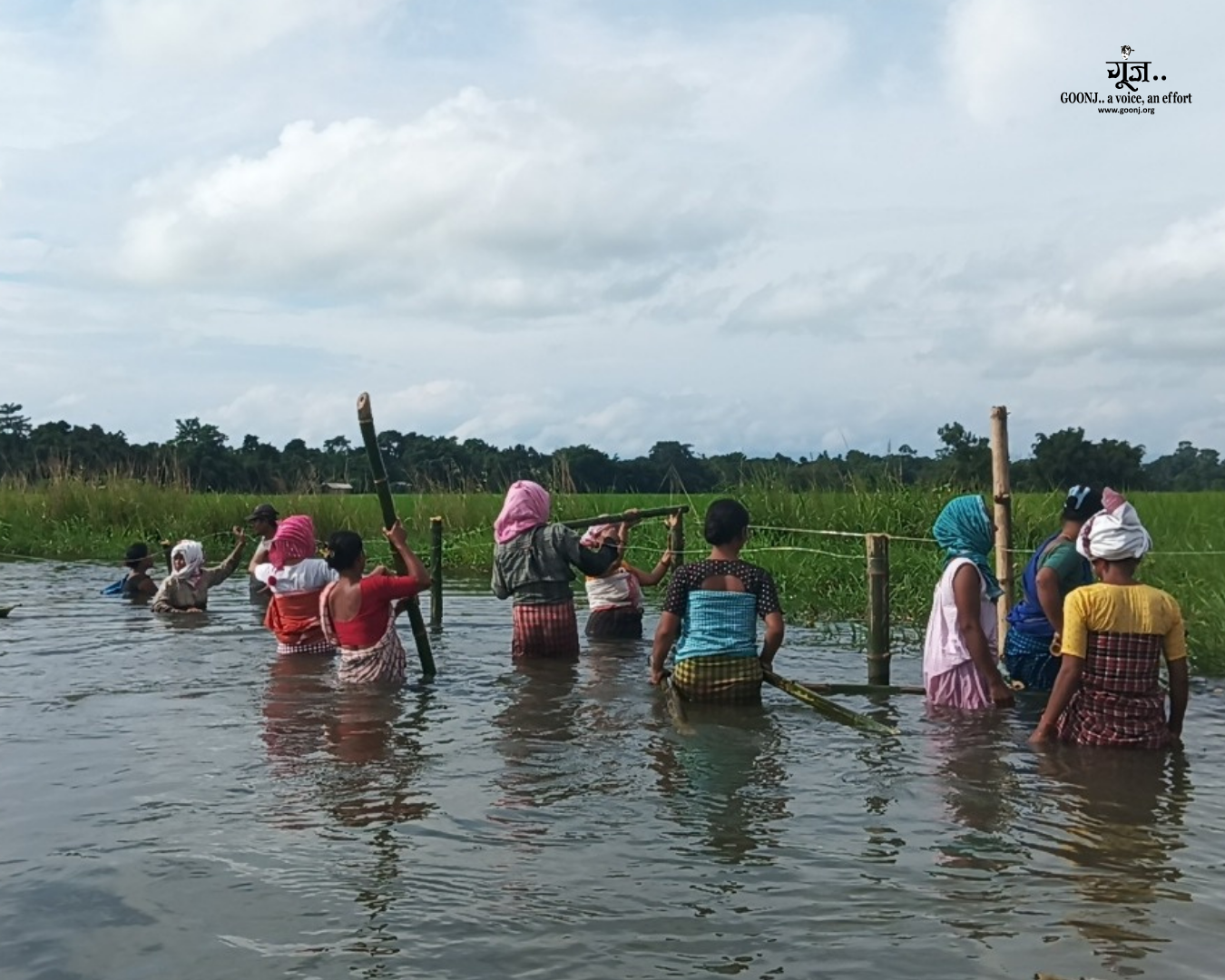 Community Members Building a Bamboo Bridge in Flood-Affected Assam