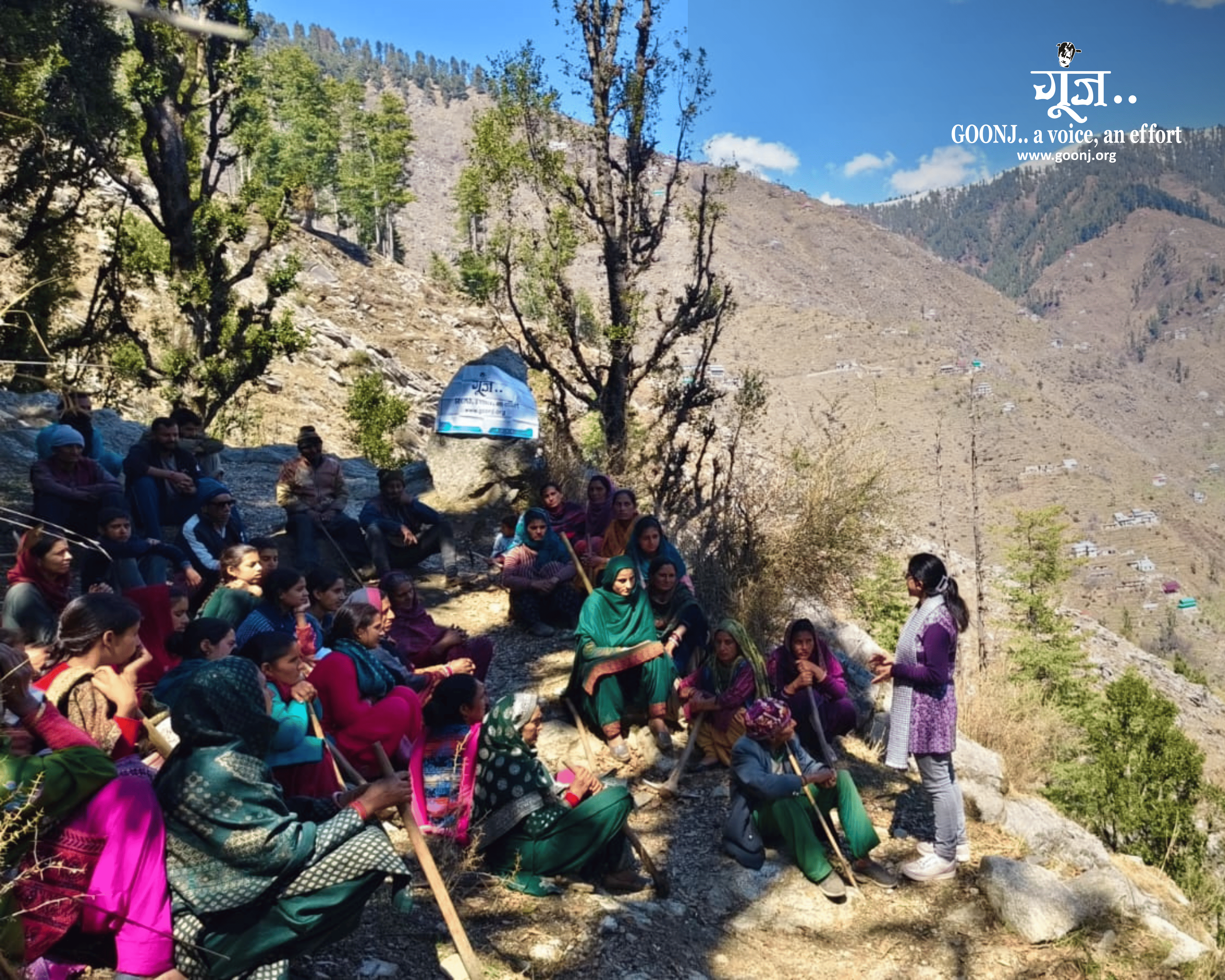 Community members in Chabba gather to discuss repairing the village pathway and restoring their drinking water spring.