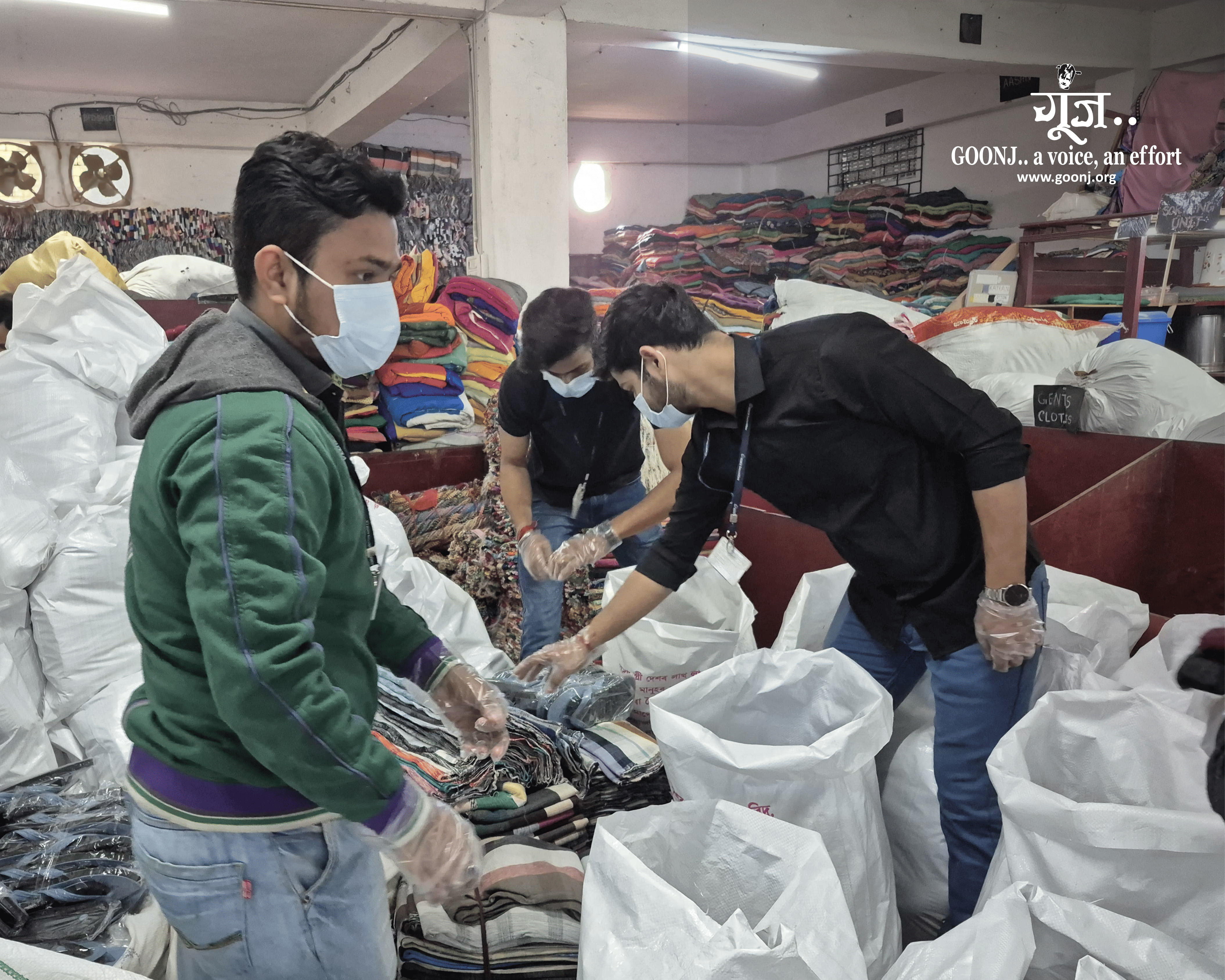 Volunteers taking part in assembling need based kits