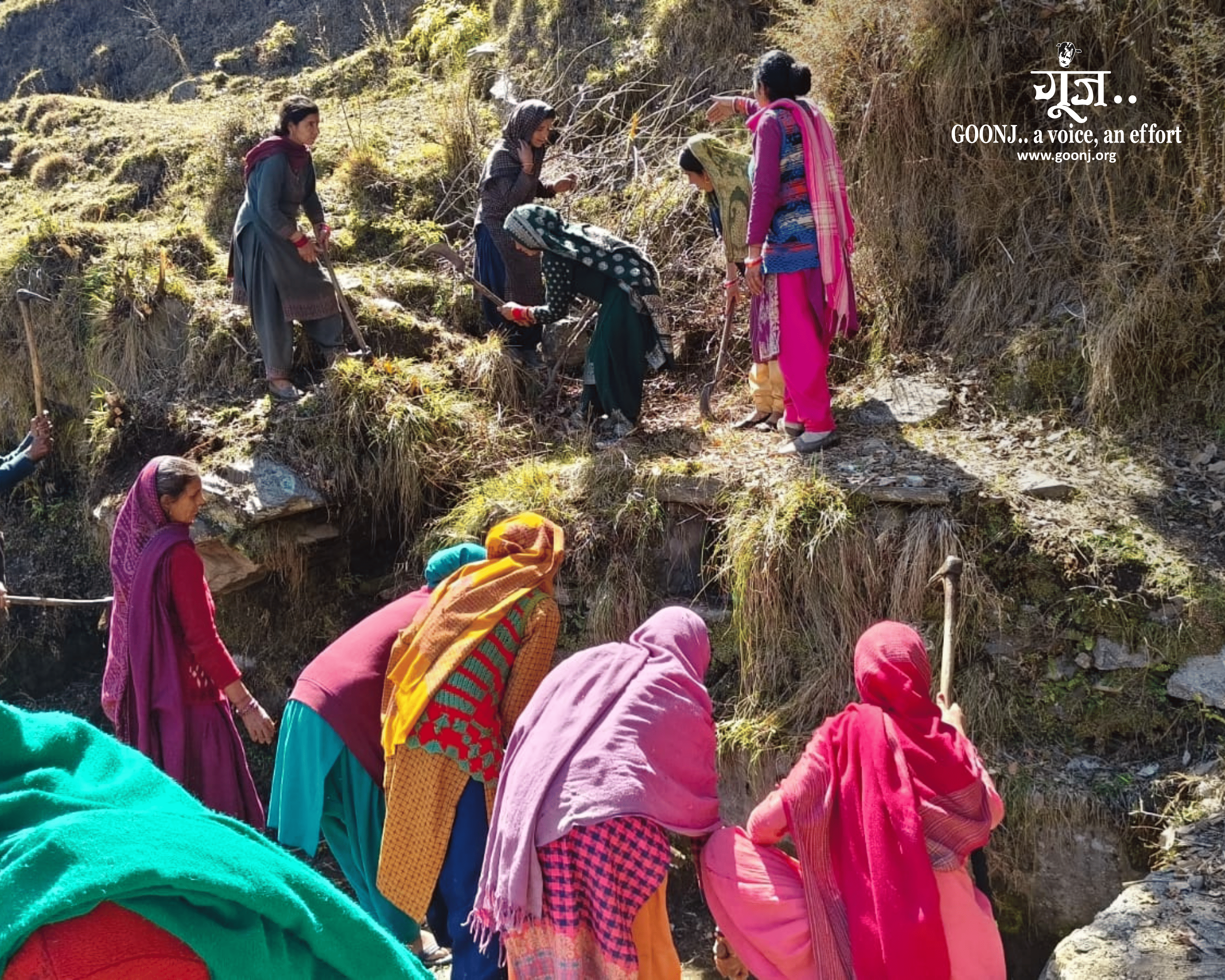 Villagers clean and restore the damaged spring that serves as Chabba′s drinking water source.